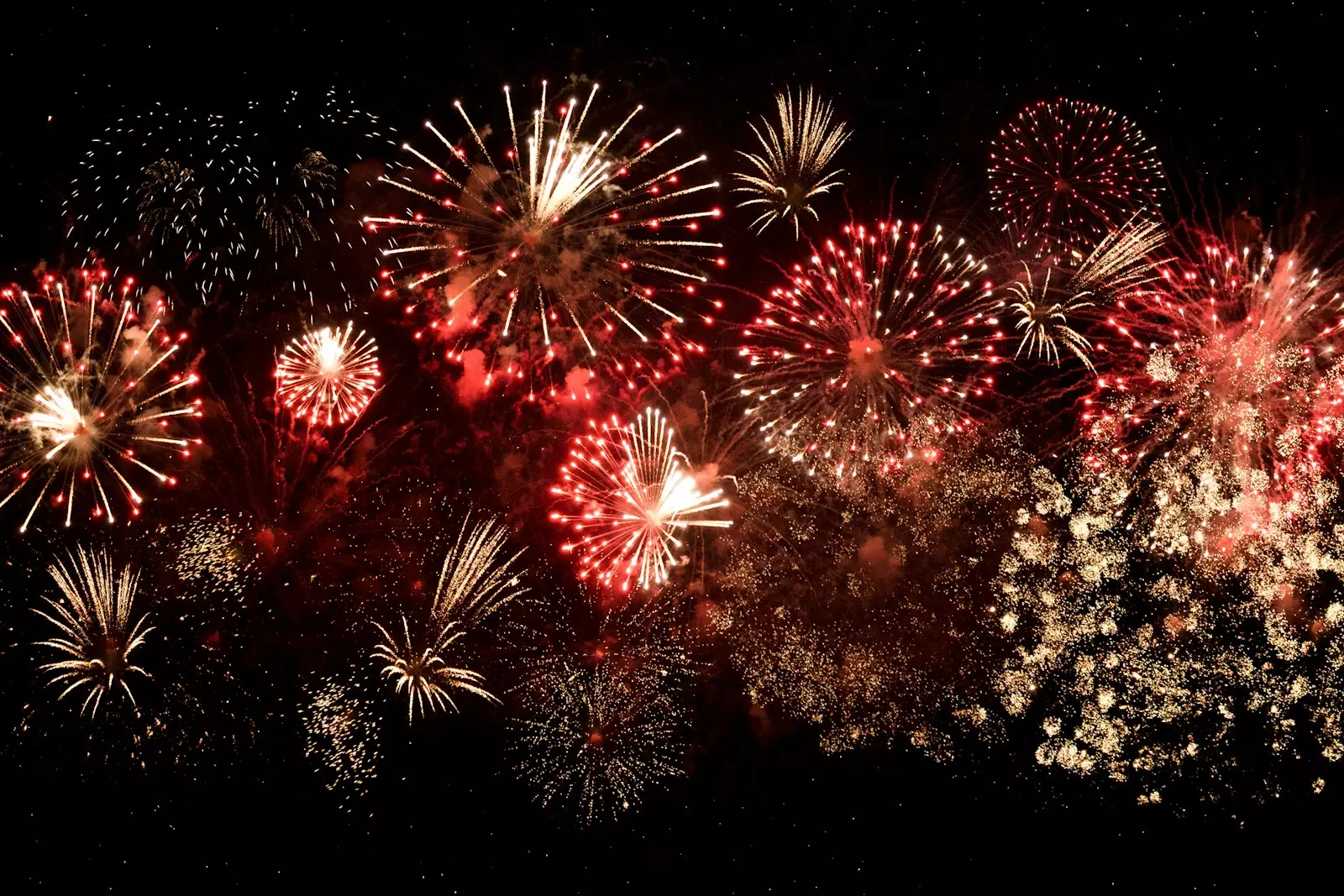Photo by DESIGNECOLOGIST yellow and red fireworks